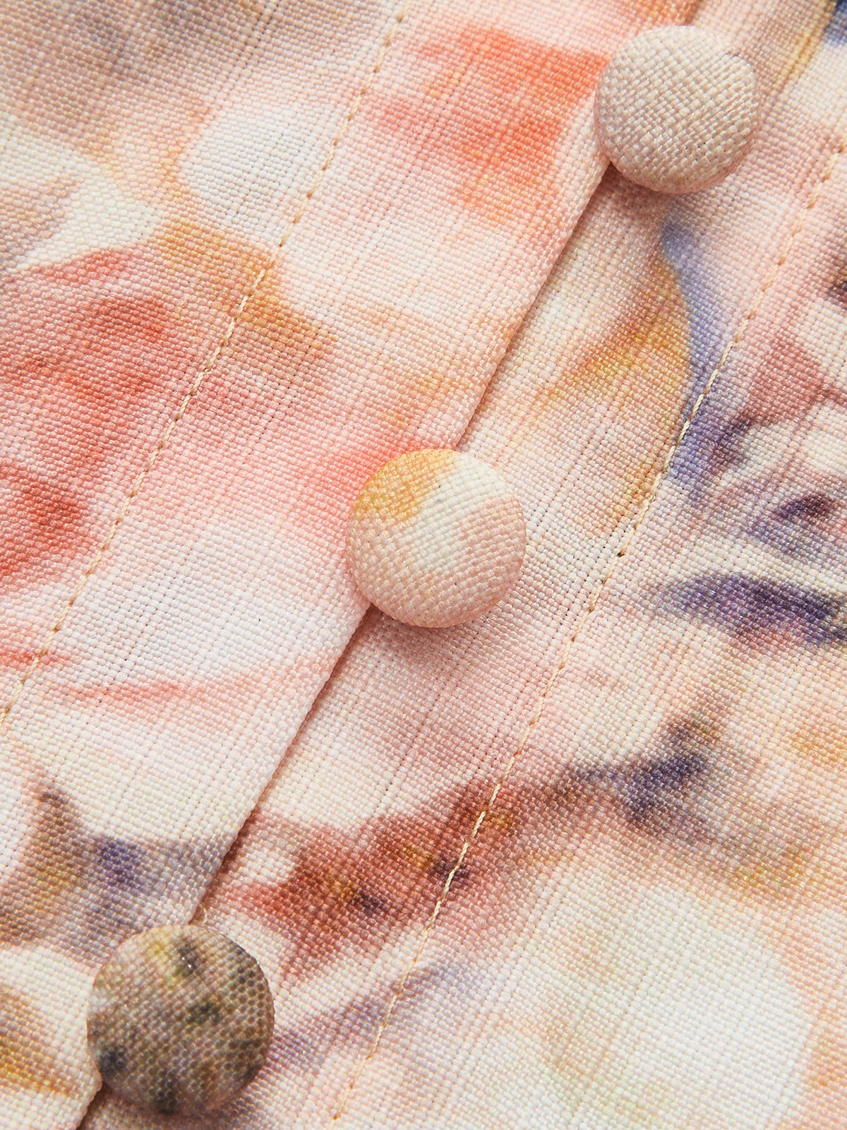 Vestido floral con mangas globo y cinturón