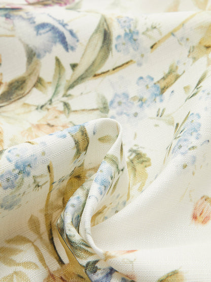 Vestido floral con mangas globo y cinturón